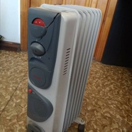 Масляный обогреватель РЕСАНТА ОМ-7НВ [67/3/10] 1,9кВт с вентилятором, 330?240?630, 7секций, 8,3кг }